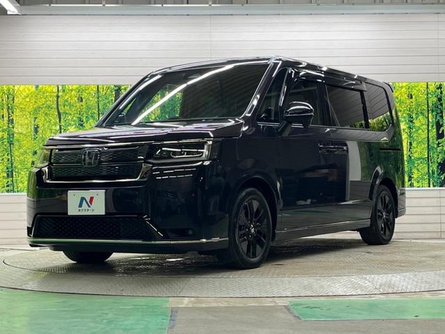 ステップワゴン ｅ：ＨＥＶスパーダ　禁煙車　純正１１．４型ナビＴＶ　純正１５．６型後席モニター　バックカメラ　ホンダセンシング　両側電動ドア　電動バックドア　渋滞追従アダプティブクルーズ　半革　シートヒーター　後席オートエアコン（59枚目）