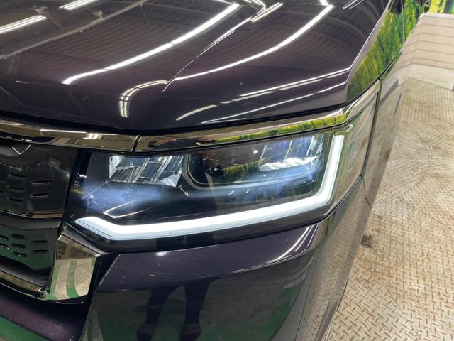 ステップワゴン ｅ：ＨＥＶスパーダ　禁煙車　純正１１．４型ナビＴＶ　純正１５．６型後席モニター　バックカメラ　ホンダセンシング　両側電動ドア　電動バックドア　渋滞追従アダプティブクルーズ　半革　シートヒーター　後席オートエアコン（65枚目）