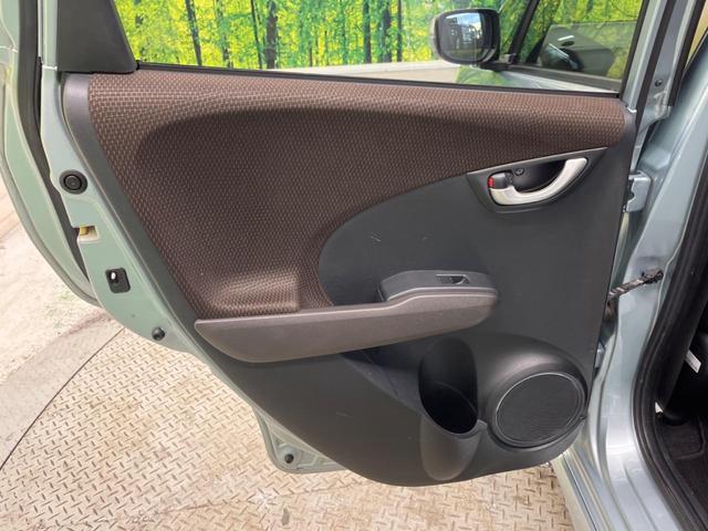 フィットシャトルハイブリッド ハイブリッド・スマートセレクション　ファインライン　禁煙車　純正ナビＴＶ　バックカメラ　ＨＩＤヘッド　クルーズコントロール　スマートキー　ＥＴＣ　半革シート　シートヒーター　オートライト　オートエアコン　４スピーカー　ＤＶＤ再生（24枚目）