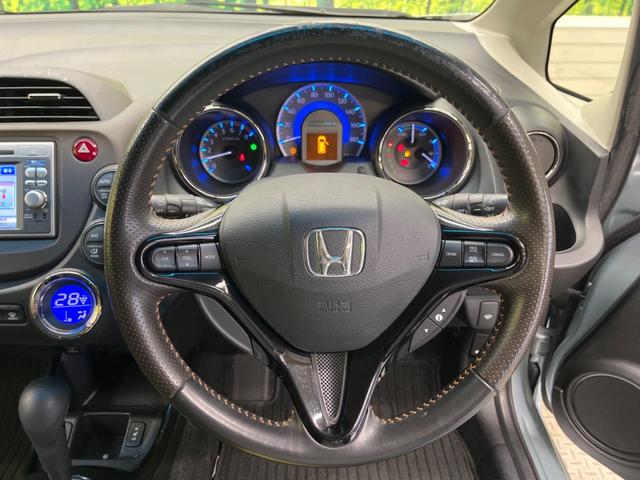 フィットシャトルハイブリッド ハイブリッド・スマートセレクション　ファインライン　禁煙車　純正ナビＴＶ　バックカメラ　ＨＩＤヘッド　クルーズコントロール　スマートキー　ＥＴＣ　半革シート　シートヒーター　オートライト　オートエアコン　４スピーカー　ＤＶＤ再生（30枚目）