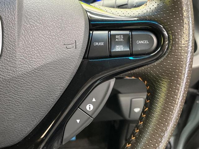 フィットシャトルハイブリッド ハイブリッド・スマートセレクション　ファインライン　禁煙車　純正ナビＴＶ　バックカメラ　ＨＩＤヘッド　クルーズコントロール　スマートキー　ＥＴＣ　半革シート　シートヒーター　オートライト　オートエアコン　４スピーカー　ＤＶＤ再生（32枚目）