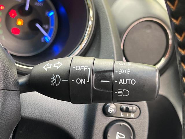 フィットシャトルハイブリッド ハイブリッド・スマートセレクション　ファインライン　禁煙車　純正ナビＴＶ　バックカメラ　ＨＩＤヘッド　クルーズコントロール　スマートキー　ＥＴＣ　半革シート　シートヒーター　オートライト　オートエアコン　４スピーカー　ＤＶＤ再生（33枚目）