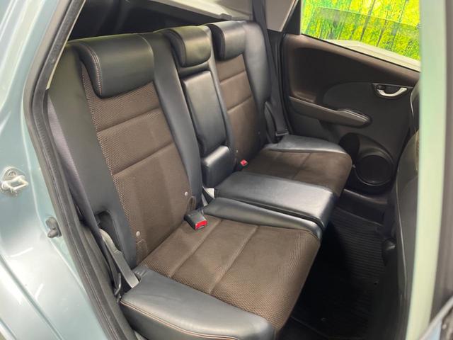 フィットシャトルハイブリッド ハイブリッド・スマートセレクション　ファインライン　禁煙車　純正ナビＴＶ　バックカメラ　ＨＩＤヘッド　クルーズコントロール　スマートキー　ＥＴＣ　半革シート　シートヒーター　オートライト　オートエアコン　４スピーカー　ＤＶＤ再生（48枚目）