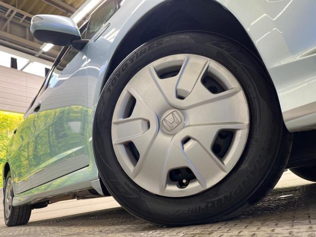 フィットシャトルハイブリッド ハイブリッド・スマートセレクション　ファインライン　禁煙車　純正ナビＴＶ　バックカメラ　ＨＩＤヘッド　クルーズコントロール　スマートキー　ＥＴＣ　半革シート　シートヒーター　オートライト　オートエアコン　４スピーカー　ＤＶＤ再生（54枚目）