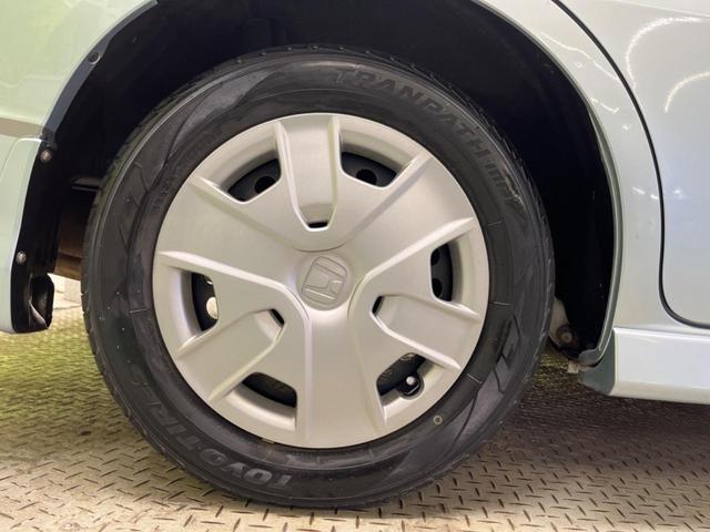 フィットシャトルハイブリッド ハイブリッド・スマートセレクション　ファインライン　禁煙車　純正ナビＴＶ　バックカメラ　ＨＩＤヘッド　クルーズコントロール　スマートキー　ＥＴＣ　半革シート　シートヒーター　オートライト　オートエアコン　４スピーカー　ＤＶＤ再生（56枚目）