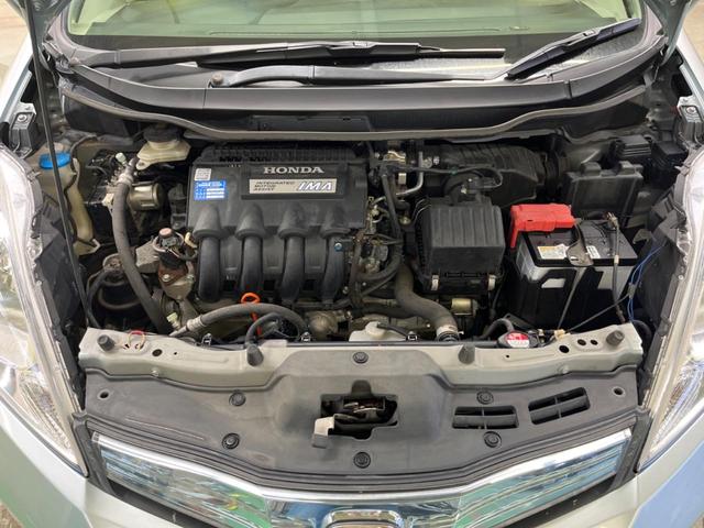 フィットシャトルハイブリッド ハイブリッド・スマートセレクション　ファインライン　禁煙車　純正ナビＴＶ　バックカメラ　ＨＩＤヘッド　クルーズコントロール　スマートキー　ＥＴＣ　半革シート　シートヒーター　オートライト　オートエアコン　４スピーカー　ＤＶＤ再生（58枚目）