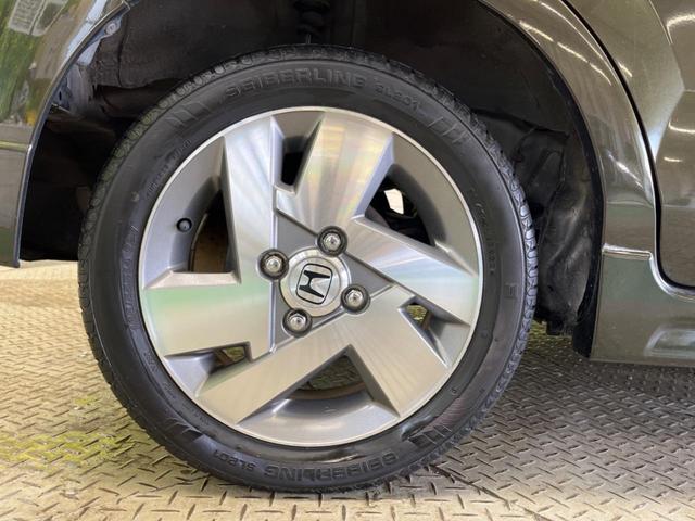 ゼストスパーク W 禁煙車 HIDヘッド 純正14インチAW スマートキー オートエアコン 純正CDオーディオ スエード調ファブリックシート(27枚目)