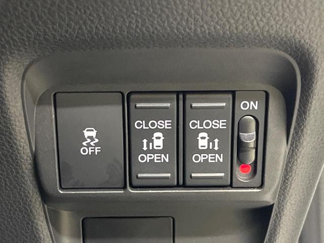 フリード ｅ：ＨＥＶエアー　ＥＸ　禁煙車　純正９型ナビＴＶ　マルチビューカメラ　両側電動ドア　ホンダセンシング　ＬＥＤヘッド　純正１５インチＡＷ　アダプティブドライビングビーム　半革シート　シートヒーター　リアクーラー（6枚目）