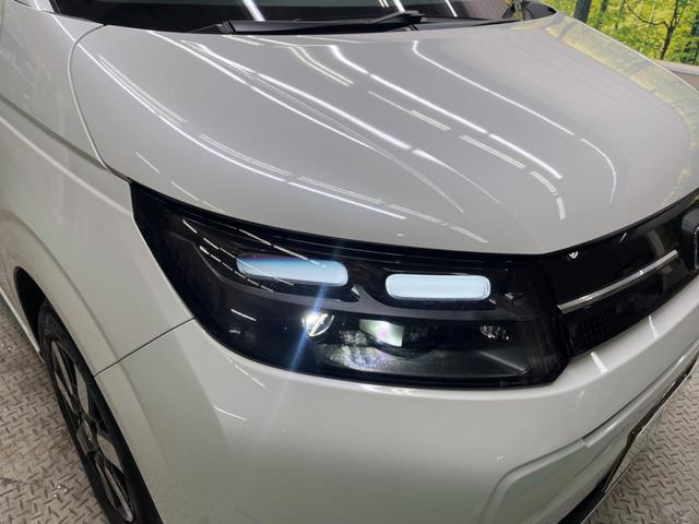 フリード ｅ：ＨＥＶエアー　ＥＸ　禁煙車　純正９型ナビＴＶ　マルチビューカメラ　両側電動ドア　ホンダセンシング　ＬＥＤヘッド　純正１５インチＡＷ　アダプティブドライビングビーム　半革シート　シートヒーター　リアクーラー（12枚目）