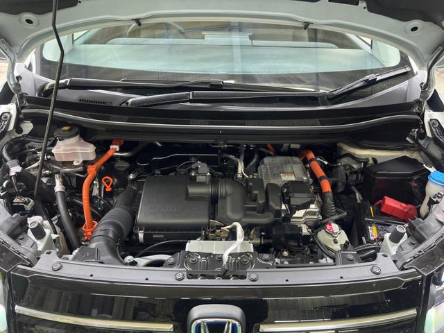 フリード ｅ：ＨＥＶエアー　ＥＸ　禁煙車　純正９型ナビＴＶ　マルチビューカメラ　両側電動ドア　ホンダセンシング　ＬＥＤヘッド　純正１５インチＡＷ　アダプティブドライビングビーム　半革シート　シートヒーター　リアクーラー（18枚目）