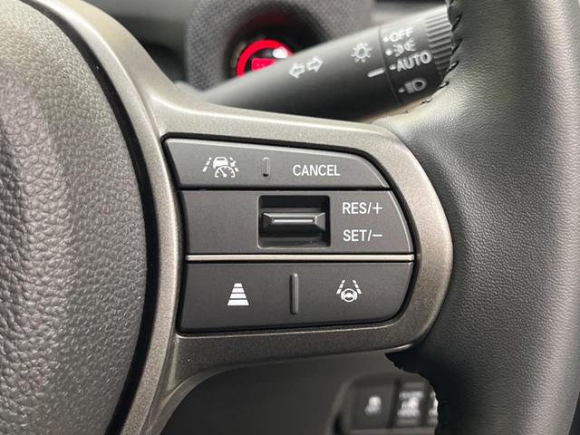 フリード ｅ：ＨＥＶエアー　ＥＸ　禁煙車　純正９型ナビＴＶ　マルチビューカメラ　両側電動ドア　ホンダセンシング　ＬＥＤヘッド　純正１５インチＡＷ　アダプティブドライビングビーム　半革シート　シートヒーター　リアクーラー（27枚目）