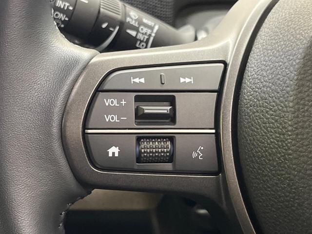 フリード ｅ：ＨＥＶエアー　ＥＸ　禁煙車　純正９型ナビＴＶ　マルチビューカメラ　両側電動ドア　ホンダセンシング　ＬＥＤヘッド　純正１５インチＡＷ　アダプティブドライビングビーム　半革シート　シートヒーター　リアクーラー（29枚目）