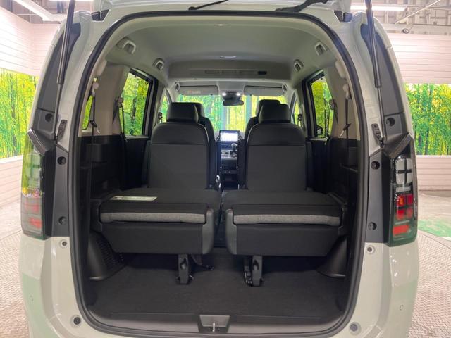 フリード ｅ：ＨＥＶエアー　ＥＸ　禁煙車　純正９型ナビＴＶ　マルチビューカメラ　両側電動ドア　ホンダセンシング　ＬＥＤヘッド　純正１５インチＡＷ　アダプティブドライビングビーム　半革シート　シートヒーター　リアクーラー（37枚目）