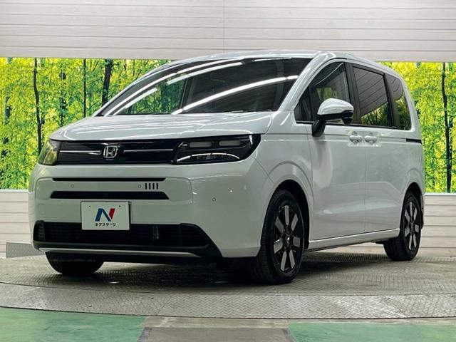 フリード ｅ：ＨＥＶエアー　ＥＸ　禁煙車　純正９型ナビＴＶ　マルチビューカメラ　両側電動ドア　ホンダセンシング　ＬＥＤヘッド　純正１５インチＡＷ　アダプティブドライビングビーム　半革シート　シートヒーター　リアクーラー（51枚目）