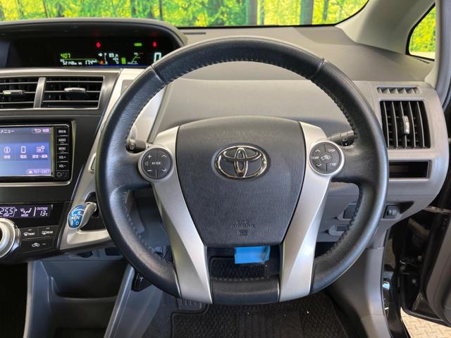 プリウスアルファ Ｓ　禁煙車　純正ナビＴＶ　バックカメラ　ＥＴＣ　Ｂｌｕｅｔｏｏｔｈ　スマートキー　純正１６インチＡＷ　フロントフォグランプ　革巻ステアリング　オートエアコン　オートライト　６スピーカー（11枚目）