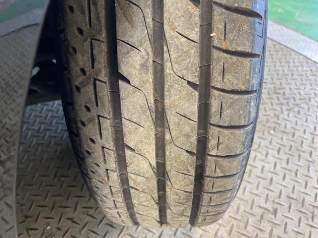 プリウスアルファ Ｓ　禁煙車　純正ナビＴＶ　バックカメラ　ＥＴＣ　Ｂｌｕｅｔｏｏｔｈ　スマートキー　純正１６インチＡＷ　フロントフォグランプ　革巻ステアリング　オートエアコン　オートライト　６スピーカー（56枚目）