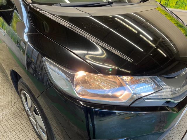 フィットハイブリッド Ｆパッケージ　禁煙車　純正ナビフルセグ　バックカメラ　スマートキー　ＥＴＣ　Ｂｌｕｅｔｏｏｔｈ　オートエアコン　ドライブレコーダー　ステアリングリモコン　ＤＶＤ再生　４スピーカー（12枚目）