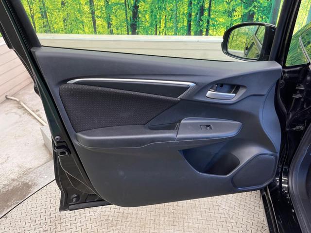 フィットハイブリッド Ｆパッケージ　禁煙車　純正ナビフルセグ　バックカメラ　スマートキー　ＥＴＣ　Ｂｌｕｅｔｏｏｔｈ　オートエアコン　ドライブレコーダー　ステアリングリモコン　ＤＶＤ再生　４スピーカー（34枚目）