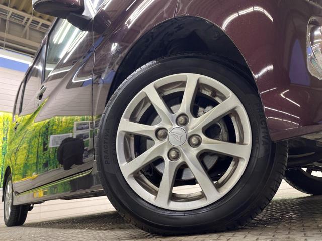 タント Ｇスペシャル　禁煙車　ナビフルセグ　バックカメラ　電動スライドドア　黒内装　純正１４インチＡＷ　フロントフォグランプ　スマートキー　オートエアコン　ＤＶＤ再生（13枚目）