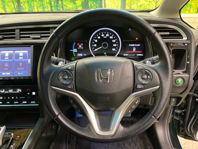 シャトル ハイブリッドX ホンダセンシング 禁煙車 純正8型ナビTV バックカメラ LEDヘッド アダプティブクルーズ ETC Bluetooth スマートキー 半革シート シートヒーター オートライト オートエアコン DVD再生(5枚目)