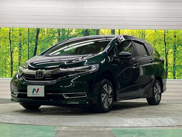 シャトル ハイブリッドX ホンダセンシング 禁煙車 純正8型ナビTV バックカメラ LEDヘッド アダプティブクルーズ ETC Bluetooth スマートキー 半革シート シートヒーター オートライト オートエアコン DVD再生(53枚目)