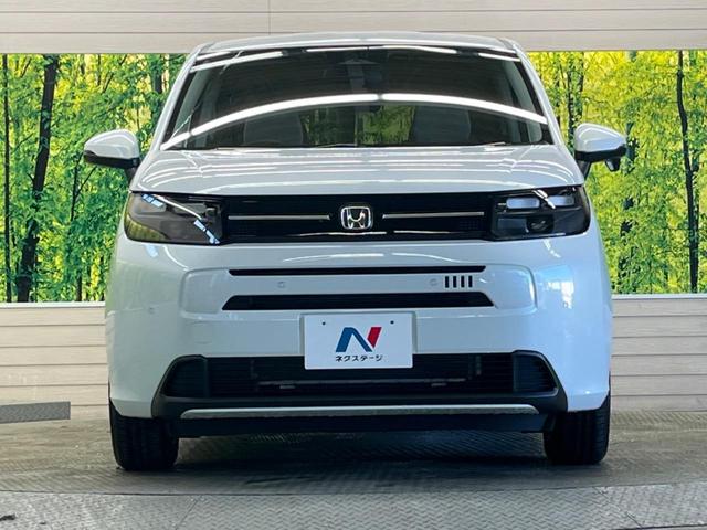 フリード エアー　登録済未使用車　純正８型ディスプレイオーディオ　両側電動ドア　バックカメラ　ホンダセンシング　渋滞追従アダプティブクルーズ　ＬＥＤヘッド　パーキングセンサ　オートハイビーム　後席サンシェード（14枚目）