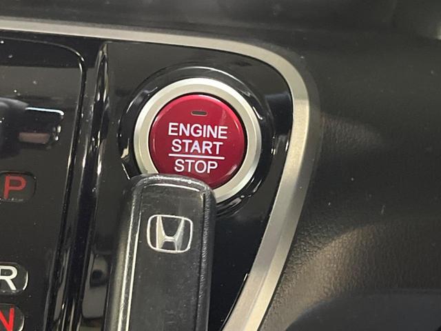 N-BOXカスタム G SSパッケージ 禁煙車 ナビフルセグ 両側電動ドア HIDヘッド 純正14インチAW Bluetooth スマートキー オートエアコン オートライト 革巻ステアリング ステアリングリモコン DVD再生(5枚目)