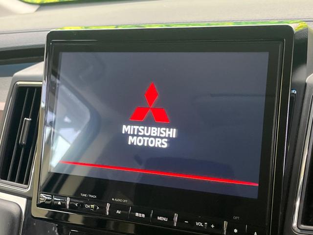 デリカD:5 P 禁煙車 純正10.1型ナビTV マルチアラウンドモニタ 両側電動ドア e-アシスト レーダークルーズ 後側方車両検知警告 パワーシート シートヒーター 電動バックドア ステアリングヒーター DVD再生(3枚目)