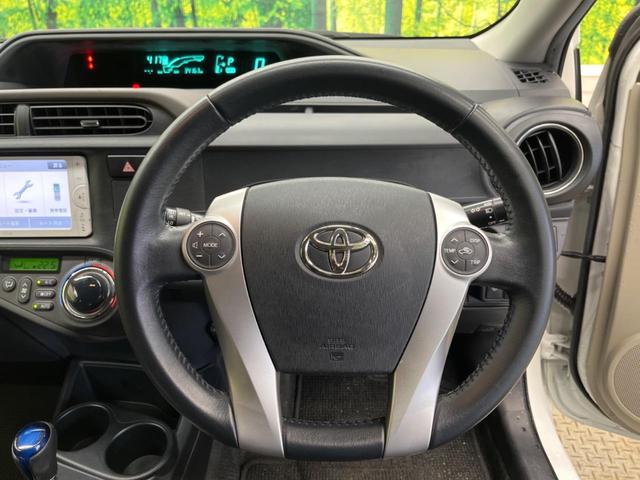 アクア Ｇ　禁煙車　純正ナビＴＶ　寒冷地仕様　スマートキー　１５インチＡＷ　ＥＴＣ　Ｂｌｕｅｔｏｏｔｈ　オートライト　オートエアコン　革巻ステアリング　ステアリングリモコン　６スピーカー　デアイサー（11枚目）