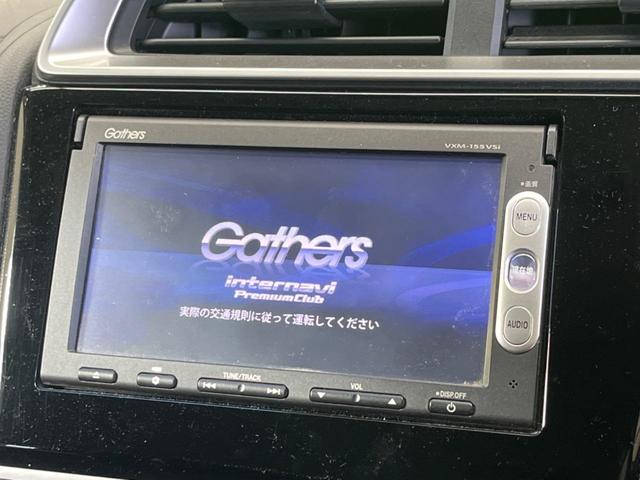 フィットハイブリッド Ｆパッケージ　禁煙車　純正ナビＴＶ　バックカメラ　ＥＴＣ　Ｂｌｕｅｔｏｏｔｈ　スマートキー　オートエアコン　オート電動格納ドアミラー　４スピーカー　ステアリングリモコン　ＤＶＤ再生（3枚目）
