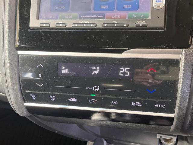 フィットハイブリッド Ｆパッケージ　禁煙車　純正ナビＴＶ　バックカメラ　ＥＴＣ　Ｂｌｕｅｔｏｏｔｈ　スマートキー　オートエアコン　オート電動格納ドアミラー　４スピーカー　ステアリングリモコン　ＤＶＤ再生（6枚目）