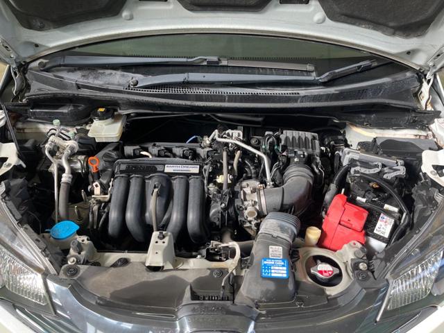 フィットハイブリッド Ｆパッケージ　禁煙車　純正ナビＴＶ　バックカメラ　ＥＴＣ　Ｂｌｕｅｔｏｏｔｈ　スマートキー　オートエアコン　オート電動格納ドアミラー　４スピーカー　ステアリングリモコン　ＤＶＤ再生（19枚目）