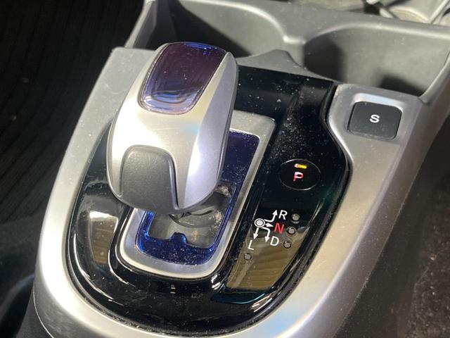 フィットハイブリッド Ｆパッケージ　禁煙車　純正ナビＴＶ　バックカメラ　ＥＴＣ　Ｂｌｕｅｔｏｏｔｈ　スマートキー　オートエアコン　オート電動格納ドアミラー　４スピーカー　ステアリングリモコン　ＤＶＤ再生（21枚目）