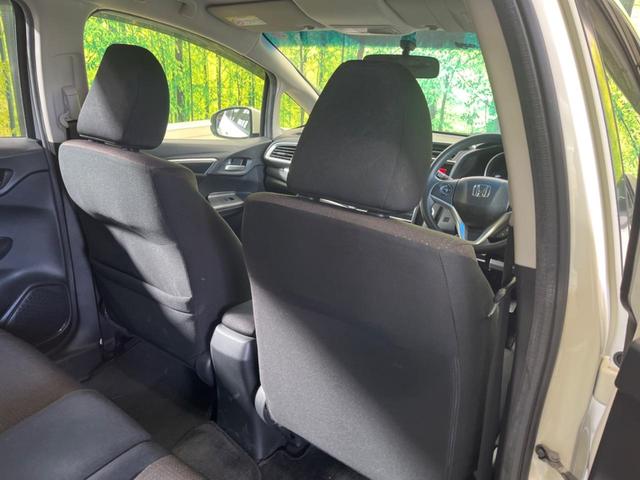 フィットハイブリッド Ｆパッケージ　禁煙車　純正ナビＴＶ　バックカメラ　ＥＴＣ　Ｂｌｕｅｔｏｏｔｈ　スマートキー　オートエアコン　オート電動格納ドアミラー　４スピーカー　ステアリングリモコン　ＤＶＤ再生（29枚目）