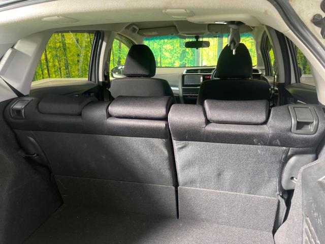 フィットハイブリッド Ｆパッケージ　禁煙車　純正ナビＴＶ　バックカメラ　ＥＴＣ　Ｂｌｕｅｔｏｏｔｈ　スマートキー　オートエアコン　オート電動格納ドアミラー　４スピーカー　ステアリングリモコン　ＤＶＤ再生（30枚目）