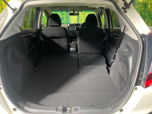 フィットハイブリッド Ｆパッケージ　禁煙車　純正ナビＴＶ　バックカメラ　ＥＴＣ　Ｂｌｕｅｔｏｏｔｈ　スマートキー　オートエアコン　オート電動格納ドアミラー　４スピーカー　ステアリングリモコン　ＤＶＤ再生（31枚目）