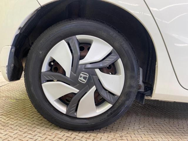 フィットハイブリッド Ｆパッケージ　禁煙車　純正ナビＴＶ　バックカメラ　ＥＴＣ　Ｂｌｕｅｔｏｏｔｈ　スマートキー　オートエアコン　オート電動格納ドアミラー　４スピーカー　ステアリングリモコン　ＤＶＤ再生（53枚目）