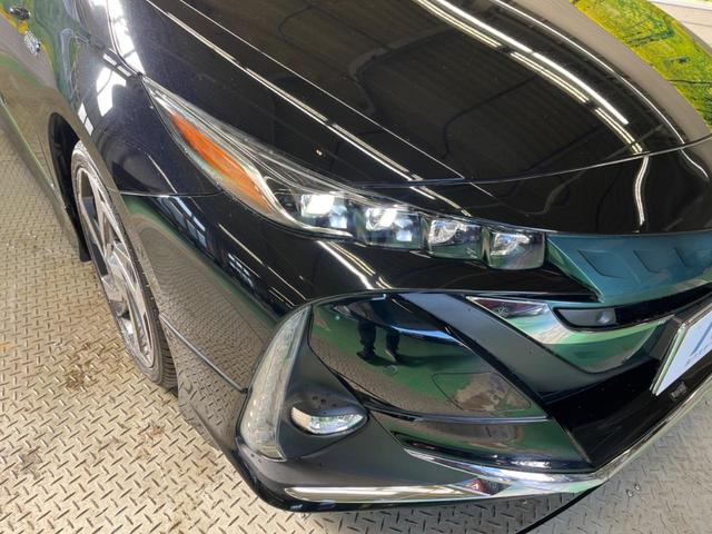 プリウスＰＨＶ Ａレザーパッケージ　モデリスタエアロ　メーカー１１．６型ナビＴＶ　ＪＢＬサウンド　ＢＬＩＴＺマフラー　モデリスタ１８インチＡＷ　バックカメラ　セーフティセンス　ブラインドスポットモニタ　インテリジェントクリアランスソナー（12枚目）