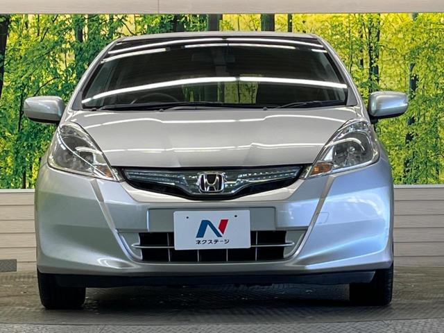 フィットハイブリッド スマートセレクション　禁煙車　純正ナビＴＶ　ＨＩＤヘッド　純正ＯＰ１５インチＡＷ　クルーズコントロール　スマートキー　オートライト　オートエアコン　革巻ステアリング　ＤＶＤ再生（14枚目）