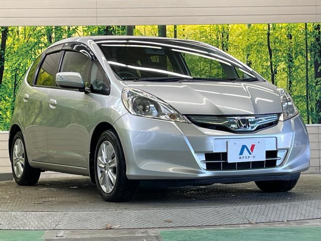 フィットハイブリッド スマートセレクション　禁煙車　純正ナビＴＶ　ＨＩＤヘッド　純正ＯＰ１５インチＡＷ　クルーズコントロール　スマートキー　オートライト　オートエアコン　革巻ステアリング　ＤＶＤ再生（16枚目）