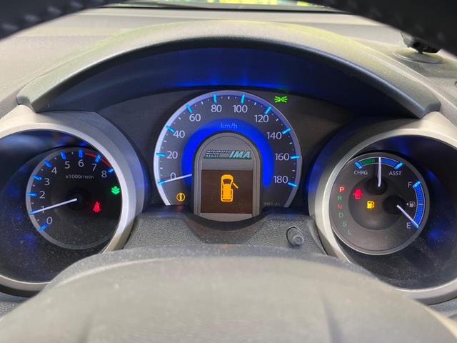 フィットハイブリッド スマートセレクション　禁煙車　純正ナビＴＶ　ＨＩＤヘッド　純正ＯＰ１５インチＡＷ　クルーズコントロール　スマートキー　オートライト　オートエアコン　革巻ステアリング　ＤＶＤ再生（43枚目）