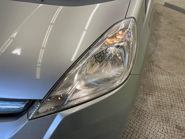 フィットハイブリッド スマートセレクション　禁煙車　純正ナビＴＶ　ＨＩＤヘッド　純正ＯＰ１５インチＡＷ　クルーズコントロール　スマートキー　オートライト　オートエアコン　革巻ステアリング　ＤＶＤ再生（50枚目）