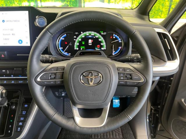 ノア ハイブリッドＳ－Ｚ　快適利便ＰＫＧ　禁煙車　純正１０．５型ナビＴＶ　純正１４型後席モニター　セーフティセンス　電動バックドア　バックカメラ　ブラインドスポットモニタ　前中列シートヒーター　後席オートエアコン（11枚目）