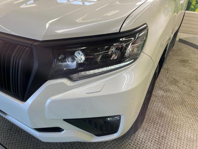 ランドクルーザープラド ＴＸ　Ｌパッケージ　マットブラックエディション　７人乗　ムーンルーフ　禁煙車　純正９型ナビ　マルチテレインモニタ　ベージュ革　セーフティセンス　レーダークルーズ　ブラインドスポットモニタ　パワーシート　シートベンチレーション　ルーフレール（66枚目）