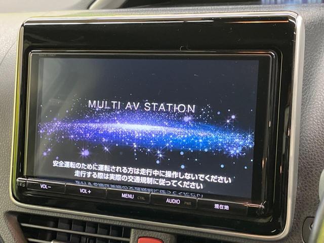 ヴォクシー ＺＳ　煌ＩＩ　禁煙車　純正９型ナビＴＶ　純正１２型後席モニター　両側電動ドア　バックカメラ　セーフティセンス　ＬＥＤヘッド　ＬＥＤフォグ　純正１６インチＡＷ　後席サンシェード　ＥＴＣ　前後個別再生　ＤＶＤ再生（3枚目）