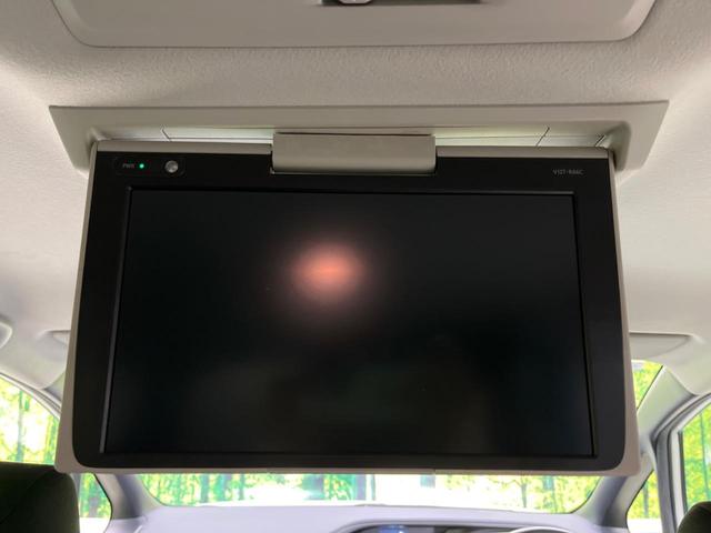 ヴォクシー ＺＳ　煌ＩＩ　禁煙車　純正９型ナビＴＶ　純正１２型後席モニター　両側電動ドア　バックカメラ　セーフティセンス　ＬＥＤヘッド　ＬＥＤフォグ　純正１６インチＡＷ　後席サンシェード　ＥＴＣ　前後個別再生　ＤＶＤ再生（4枚目）