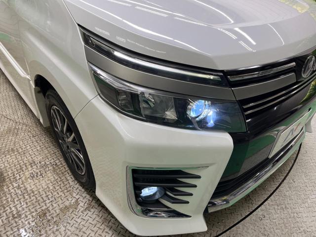 ヴォクシー ＺＳ　煌ＩＩ　禁煙車　純正９型ナビＴＶ　純正１２型後席モニター　両側電動ドア　バックカメラ　セーフティセンス　ＬＥＤヘッド　ＬＥＤフォグ　純正１６インチＡＷ　後席サンシェード　ＥＴＣ　前後個別再生　ＤＶＤ再生（12枚目）