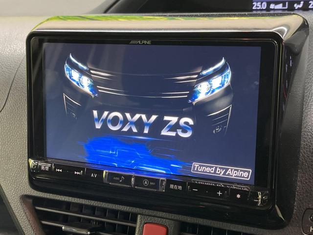 ヴォクシー ＺＳ　禁煙車　ＢＩＧ－Ｘ９型ナビＴＶ　フリップダウンモニター　両側電動ドア　バックカメラ　セーフティセンス　クルーズコントロール　ＬＥＤヘッド　純正１６インチＡＷ　デュアルオートエアコン　ＤＶＤ再生（3枚目）