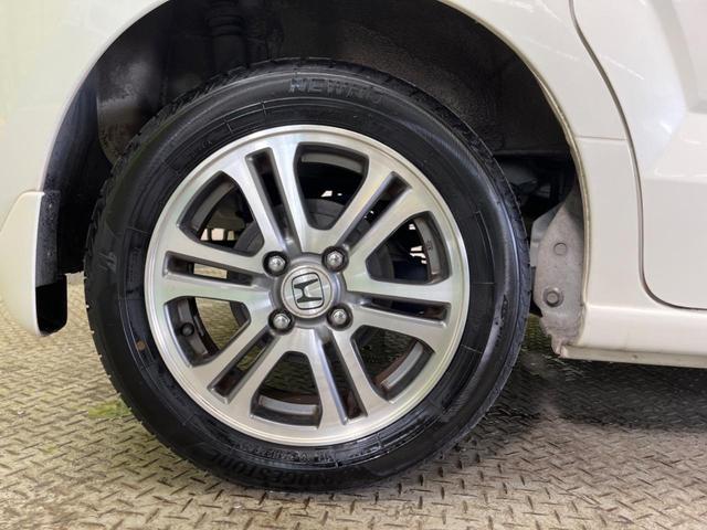 N-BOX G ターボSSパッケージ 禁煙車 8型ナビフルセグ 両側電動ドア バックカメラ HIDヘッド 純正14インチAW 黒内装 ETC Bluetooth スマートキー オートライト オートエアコン 革巻ステアリング パドルシフト(54枚目)