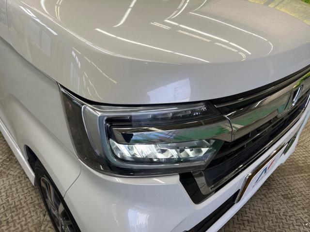 N-BOXカスタム L 禁煙車 ナビTV 両側電動ドア バックカメラ ホンダセンシング 渋滞追従アダプティブクルーズ リアパーキングセンサ 電動パーキングブレーキ シートヒーター 後席サンシェード DVD再生(52枚目)
